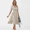 Clara Pennington | Striped V-Neck Summer Dress